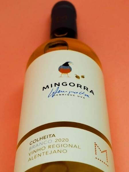 Front White Label with Logo of the Bottle