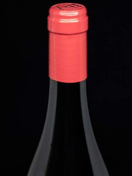 Red Cork of Bottle on Black Background