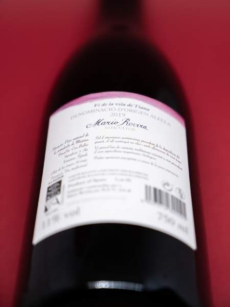 Top View of Back of bottle and it Discription
