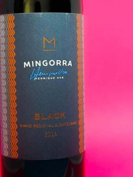 Front Label of Mingorra on Pink Background